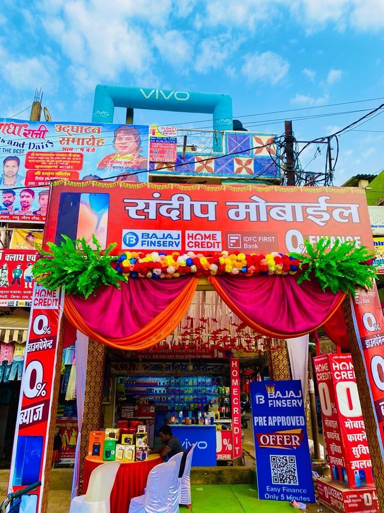 Sandeep Mobile Diwali stall with marigold garlands and 0% interest banners
